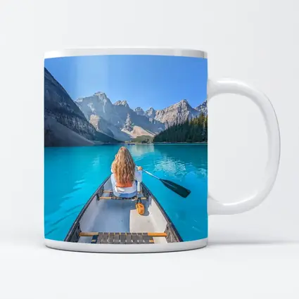 Woman Canoeing Turquoise Mountain Lake Canada