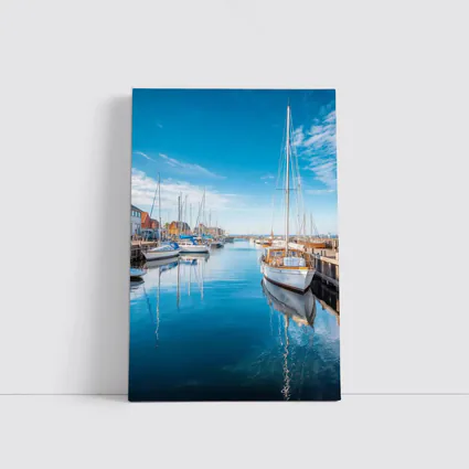 Sailboats Moored in Calm Blue Harbor