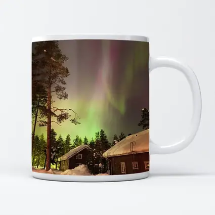 Northern Lights Over Snowy Winter Cabins