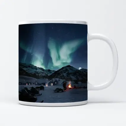 Northern Lights Over Snowy Mountain Village