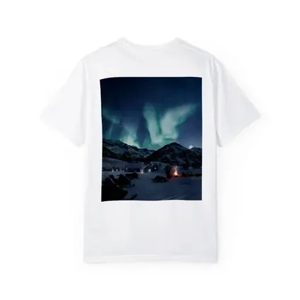 Northern Lights Over Snowy Mountain Village