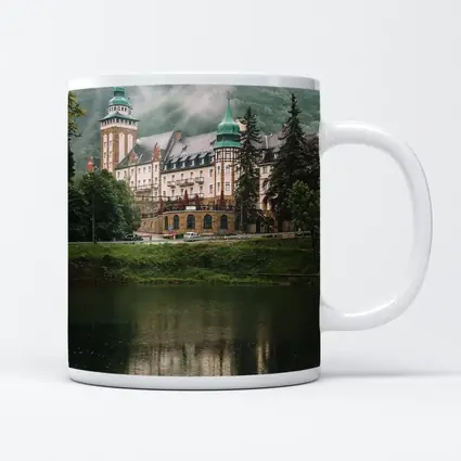 Historic Castle Reflecting On Misty Lake