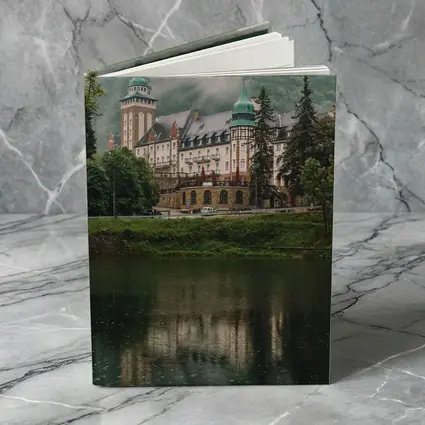 Historic Castle Reflecting On Misty Lake