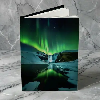 Northern Lights Over Snowy Waterfall Iceland