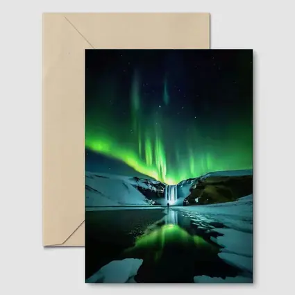 Northern Lights Over Snowy Waterfall Iceland