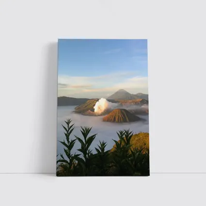Mount Bromo Volcano Erupting Above Clouds Indonesia