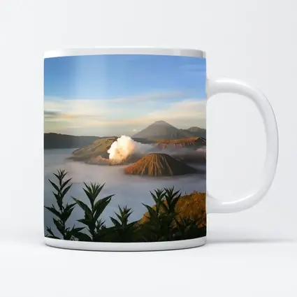Mount Bromo Volcano Erupting Above Clouds Indonesia