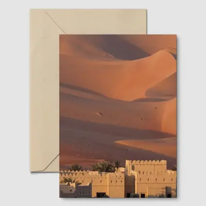 Desert Fortress Among Golden Sand Dunes