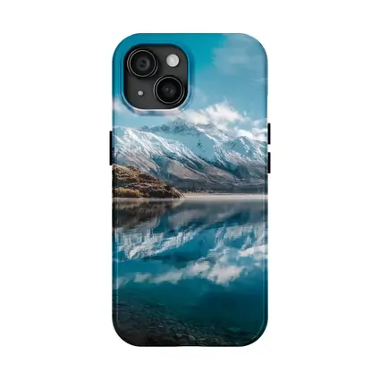 Snow Capped Mountains Reflected In Blue Lake