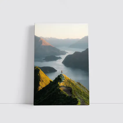 Lone Hiker Overlooking Mountain Lake Landscape