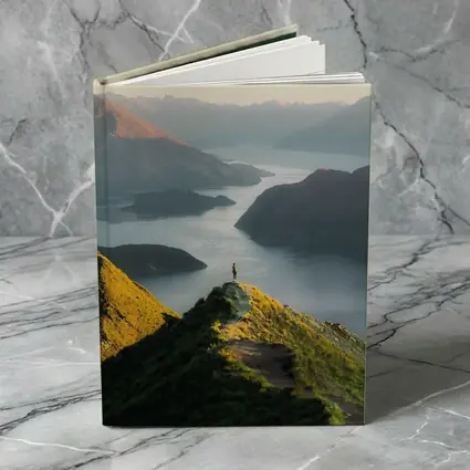 Lone Hiker Overlooking Mountain Lake Landscape