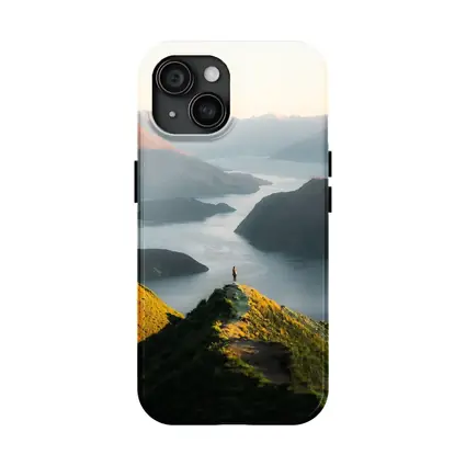 Lone Hiker Overlooking Mountain Lake Landscape