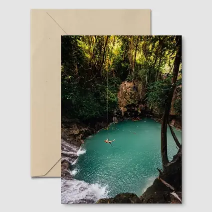 Rope Swing Over Turquoise Jungle Pool