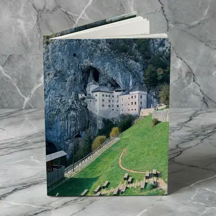 Predjama Castle Built Into Rocky Cliff