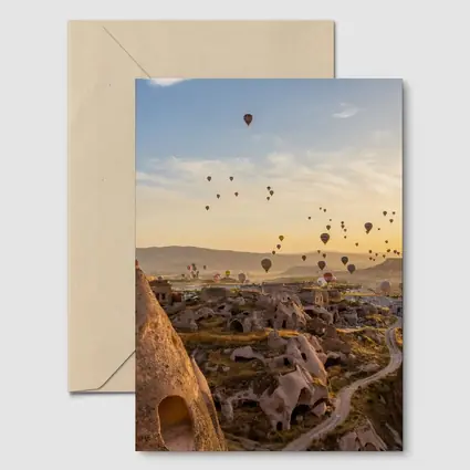 Hot Air Balloons Over Cappadocia Cave Landscape