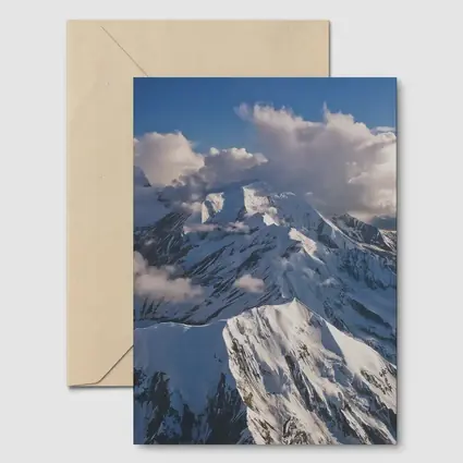 Snow Covered Mountain Peaks Blue Sky