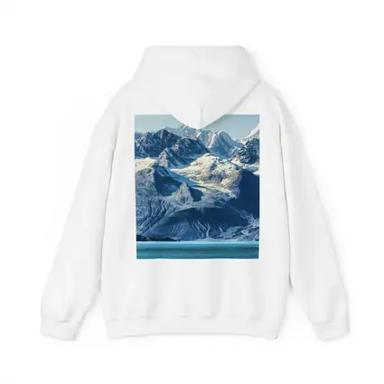 Snow Capped Mountains Over Turquoise Glacial Lake