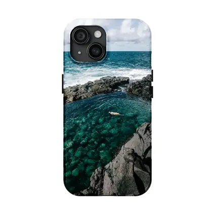 Swimmer In Clear Turquoise Volcanic Rock Pool