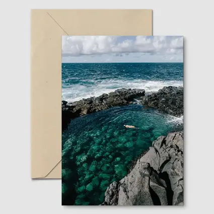 Swimmer In Clear Turquoise Volcanic Rock Pool