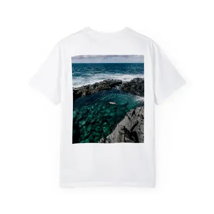 Swimmer In Clear Turquoise Volcanic Rock Pool