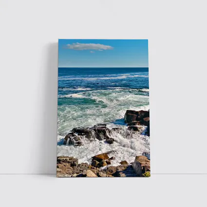 Rocky Shoreline Waves Crashing Blue Ocean