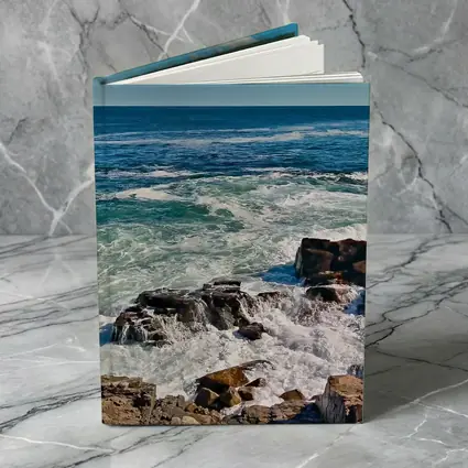 Rocky Shoreline Waves Crashing Blue Ocean