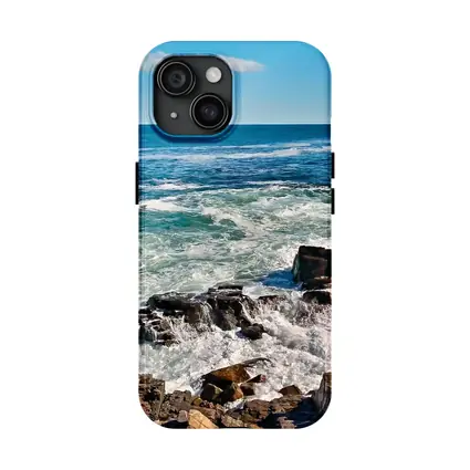 Rocky Shoreline Waves Crashing Blue Ocean