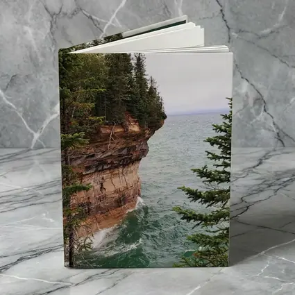 Red Sandstone Cliff Above Teal Lake