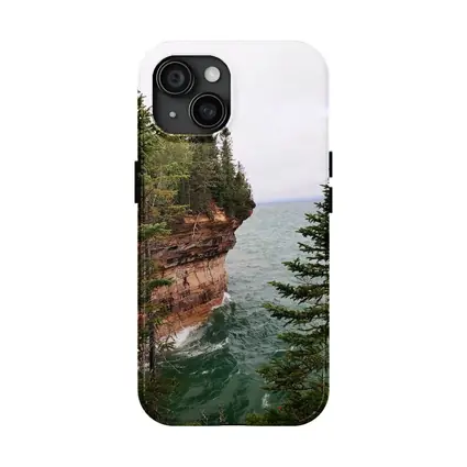 Red Sandstone Cliff Above Teal Lake