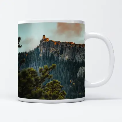 Stone Watchtower Atop Rocky Mountain Cliff