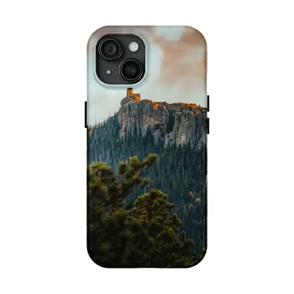 Stone Watchtower Atop Rocky Mountain Cliff