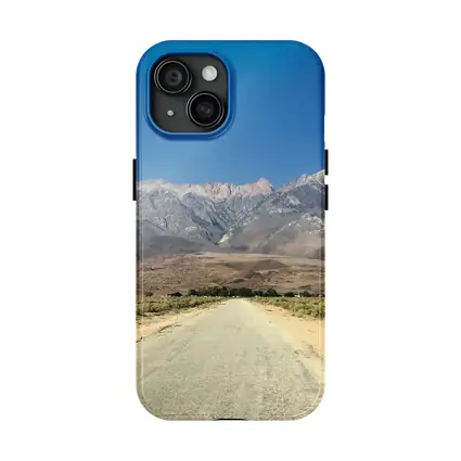Desert Road Leading To Sierra Nevada Mountains