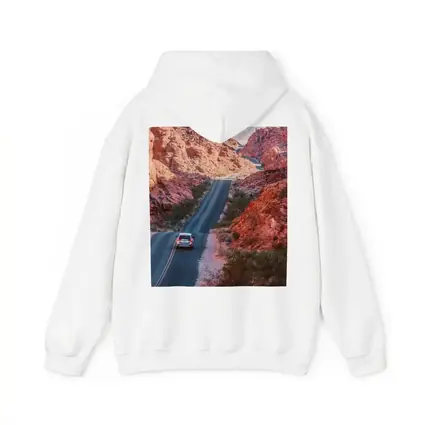 SUV Driving Through Red Rock Canyon Road