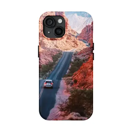SUV Driving Through Red Rock Canyon Road