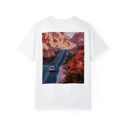 SUV Driving Through Red Rock Canyon Road
