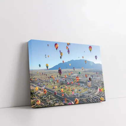 Hot Air Balloons Over Desert Mountain Landscape