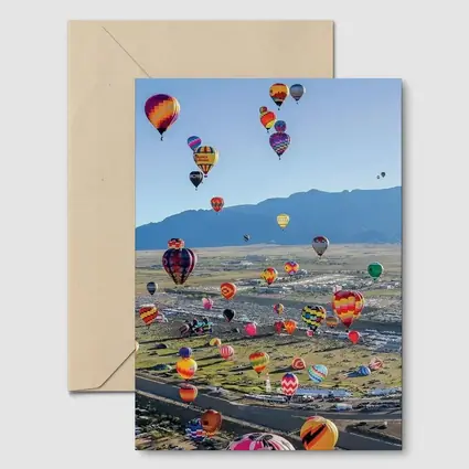 Hot Air Balloons Over Desert Mountain Landscape