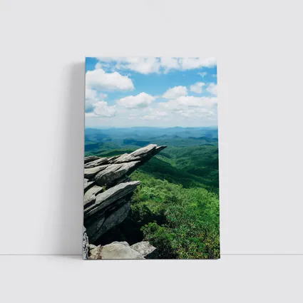 Rocky Cliff Overlooking Green Mountain Valleys