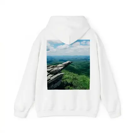 Rocky Cliff Overlooking Green Mountain Valleys