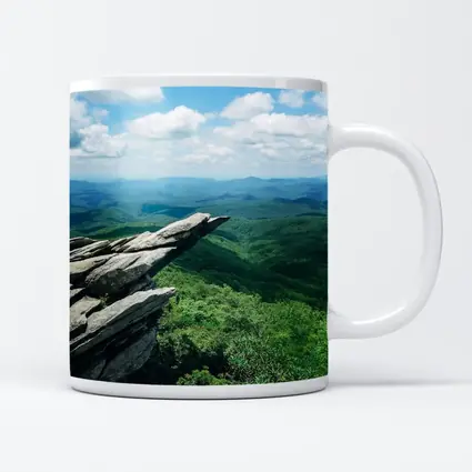 Rocky Cliff Overlooking Green Mountain Valleys