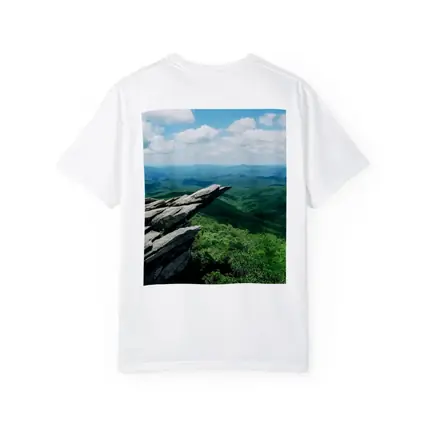Rocky Cliff Overlooking Green Mountain Valleys