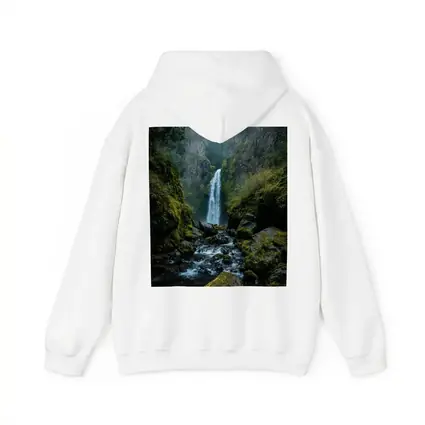 Misty Waterfall Cascading Over Mossy Rocks