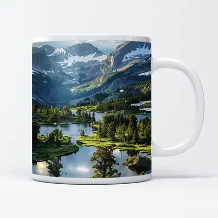 Alpine Lake Valley Snow Capped Mountains