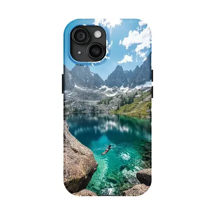 Person Swimming Alpine Lake Jagged Mountain Peaks