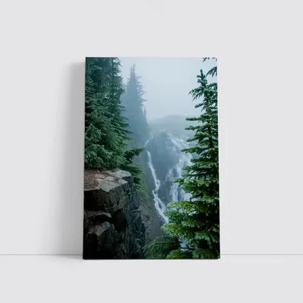 Misty Waterfall Through Foggy Pine Forest