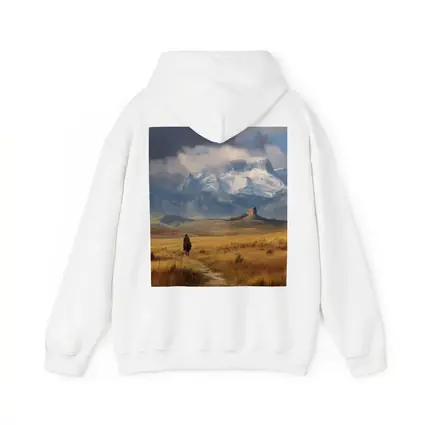 Lone Cowboy Riding Toward Snow Capped Mountains