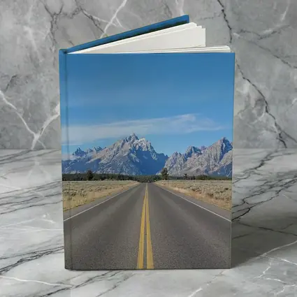 Open Road Leading to Grand Teton Mountains