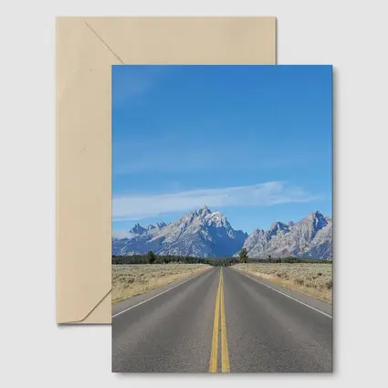 Open Road Leading to Grand Teton Mountains