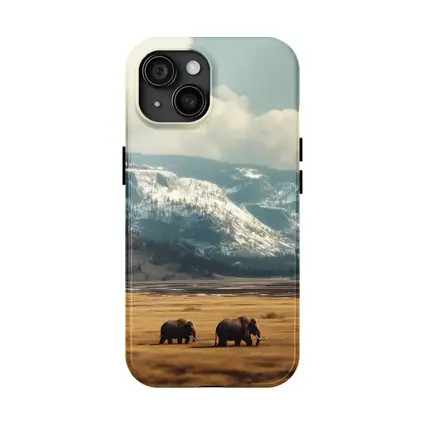 Two Elephants Walking Snowy Mountain Plains