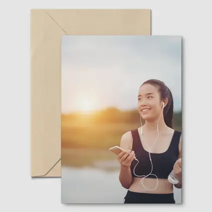 Fit Woman Running Outdoors at Sunset